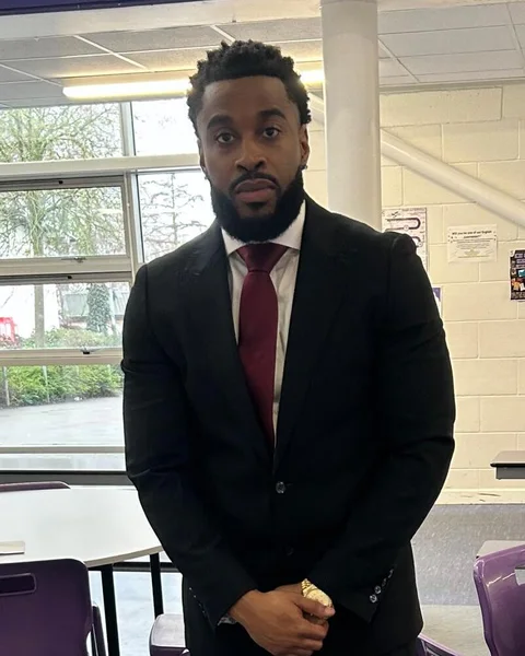 Benjamin Daley, founder & director of Independence Goals UK Ltd, in a school classroom.
